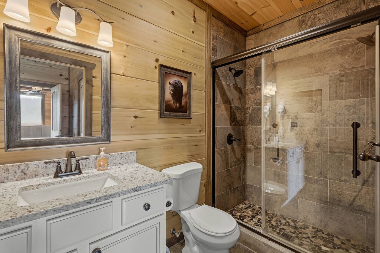 <span class="name">Entry level ensuite full bathroom with standing shower</span> <span class="name">Entry level ensuite full bathroom with standing shower</span>