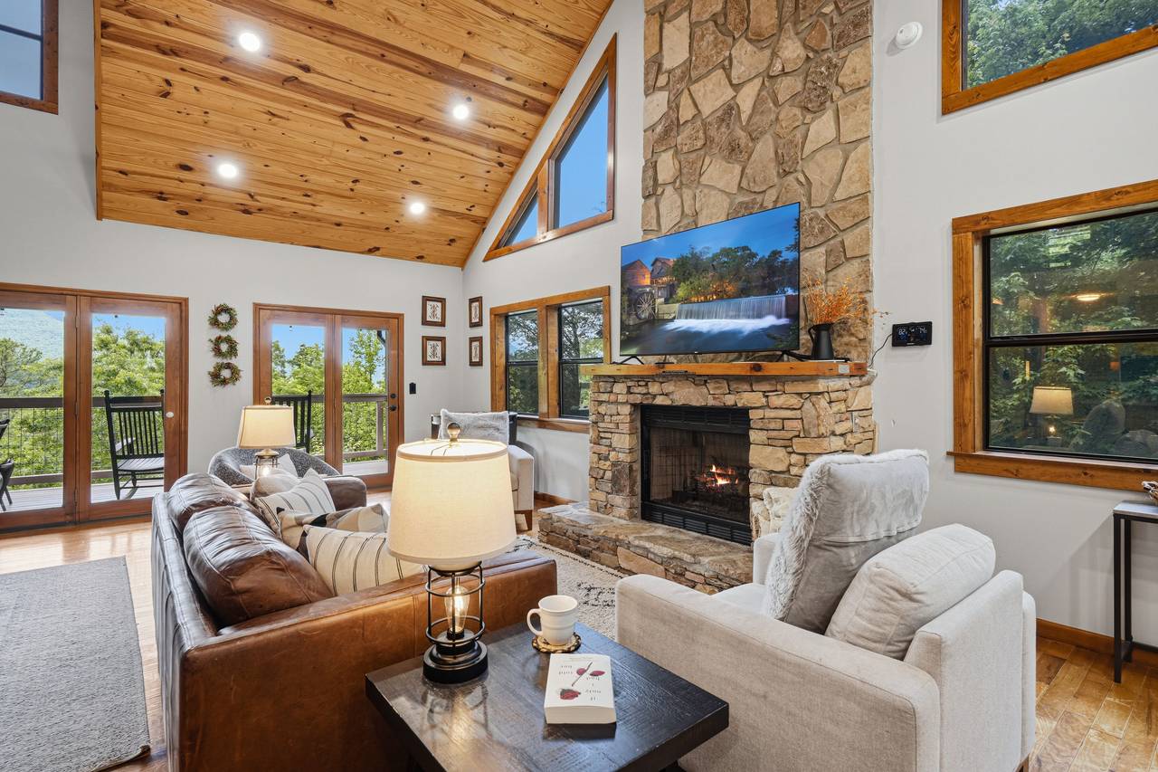 Cozy living room with fireplace and Smart TV Cozy living room with fireplace and Smart TV