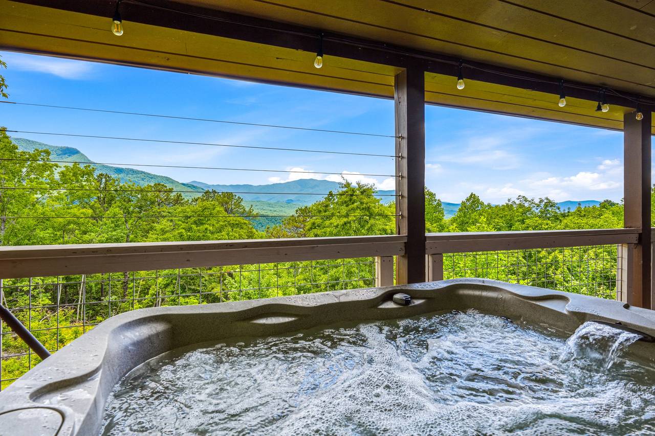 Covered hot tub deck perfect for relaxing year-round Covered hot tub deck perfect for relaxing year-round