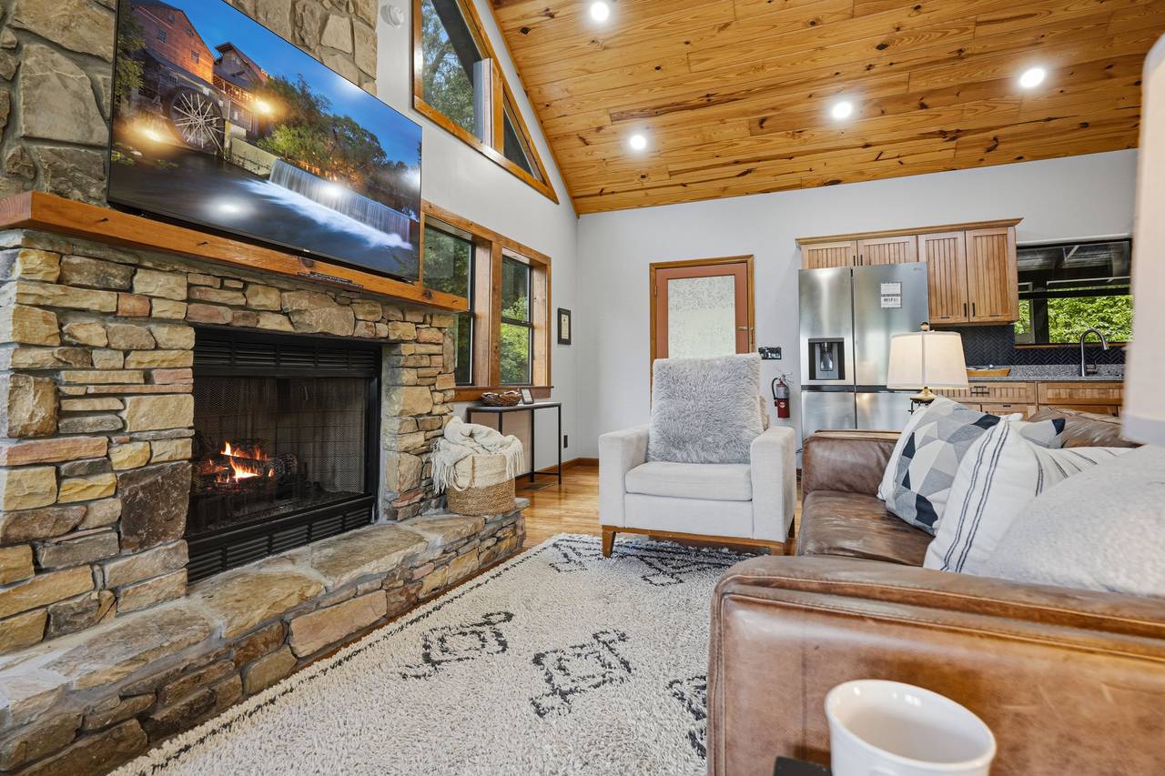 Cozy living room with fireplace and Smart TV Cozy living room with fireplace and Smart TV