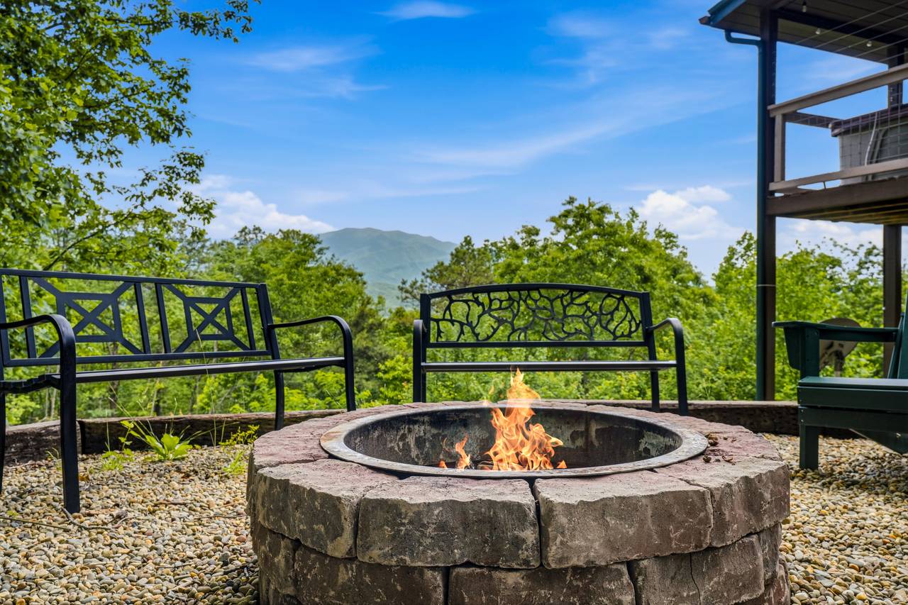 Gather around the outdoor fire pit under the stars Gather around the outdoor fire pit under the stars