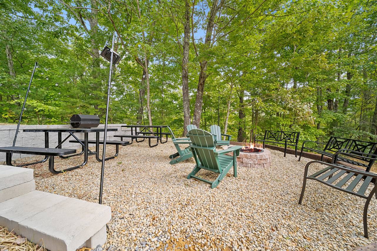 Gather around the outdoor fire pit under the stars Gather around the outdoor fire pit under the stars