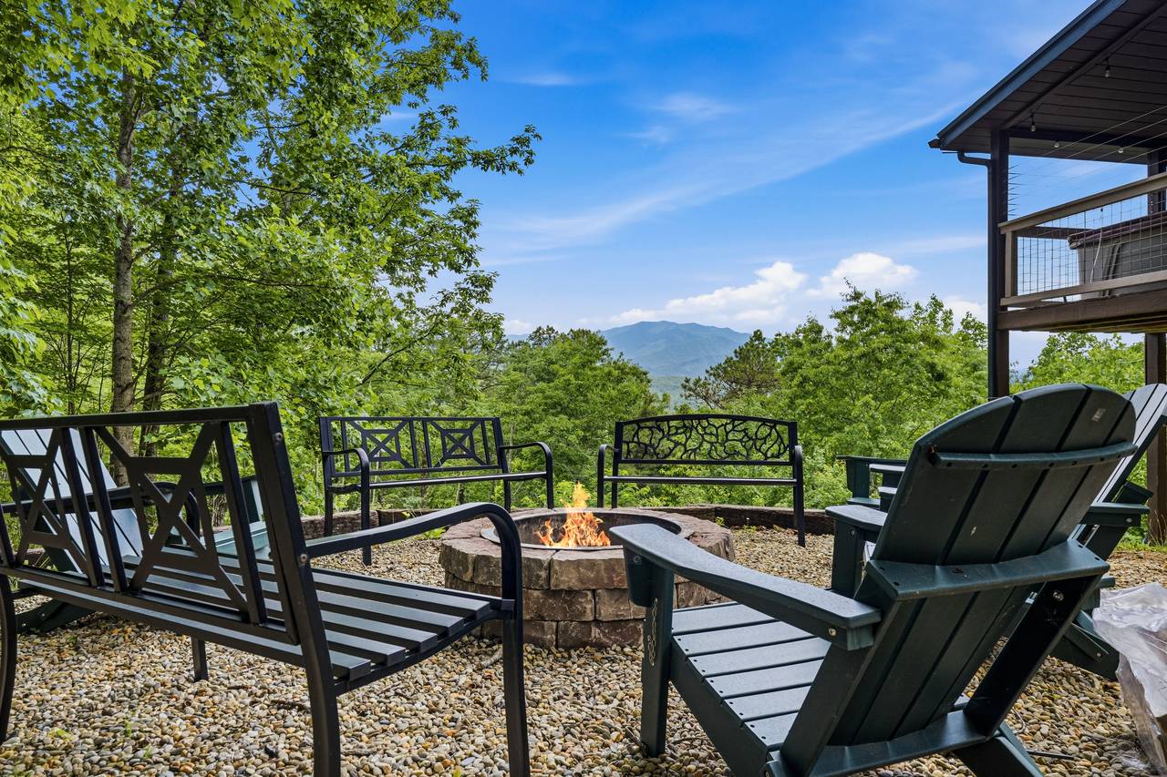 Gather around the outdoor fire pit under the stars Gather around the outdoor fire pit under the stars