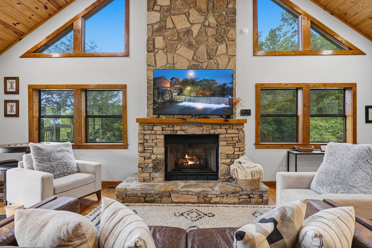 Cozy living room with fireplace and Smart TV Cozy living room with fireplace and Smart TV