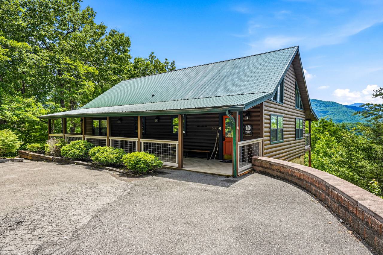 Relax on the covered porch and enjoy the mountain air Relax on the covered porch and enjoy the mountain air