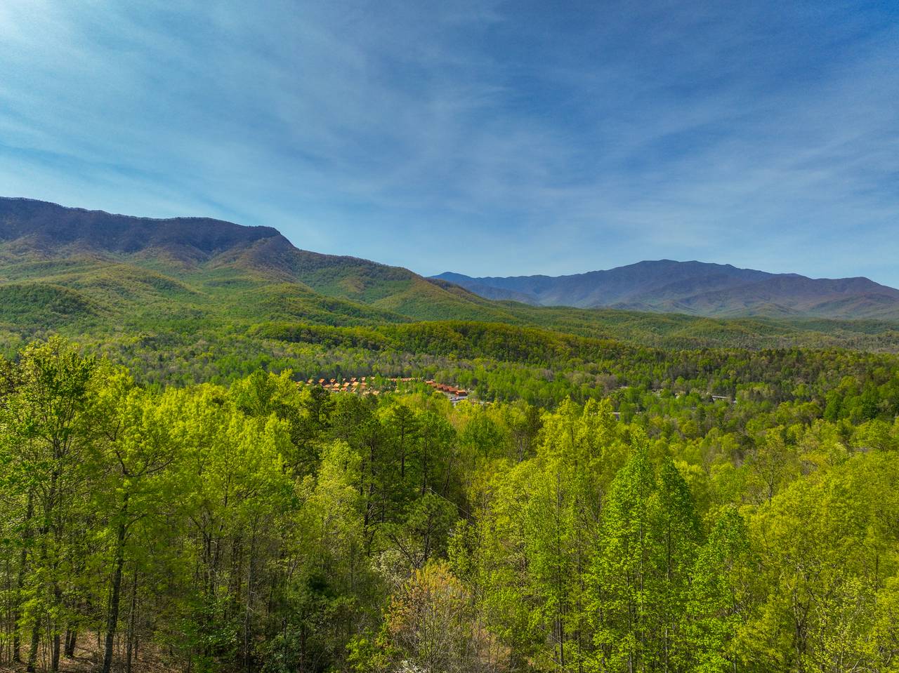 Peaceful mountain views stretch across the horizon Peaceful mountain views stretch across the horizon