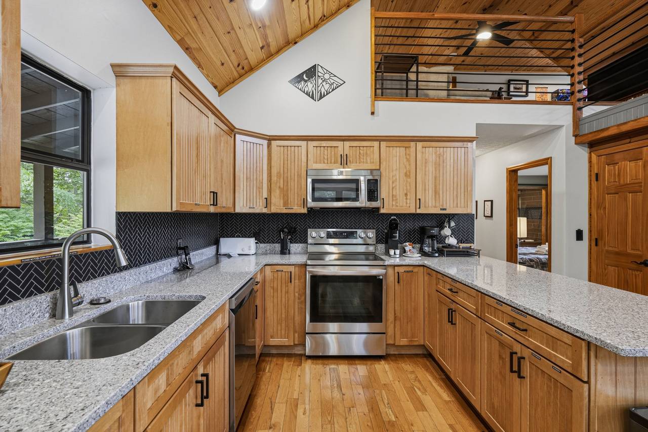 Fully equipped kitchen with modern appliances Fully equipped kitchen with modern appliances