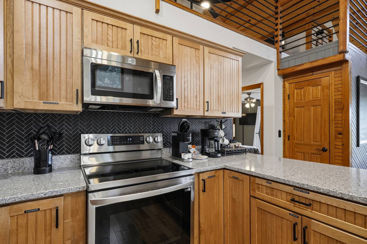 Fully equipped kitchen with modern appliances Fully equipped kitchen with modern appliances