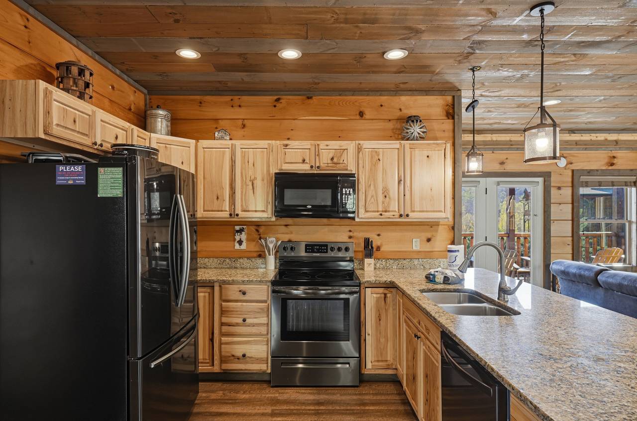 Fully equipped kitchen with modern appliances Fully equipped kitchen with modern appliances