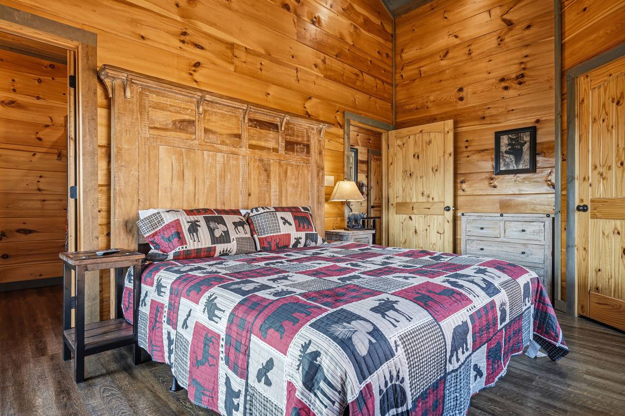 King suite with ensuite bath,TV, fireplace, & deck access King suite with ensuite bath,TV, fireplace, & deck access