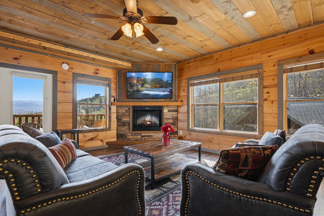 Open living room with fireplace & cozy seating Open living room with fireplace & cozy seating
