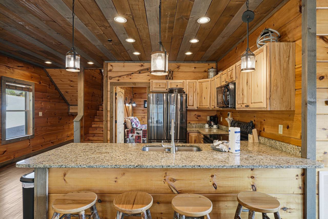 Kitchen with ample counter space & bar seating Kitchen with ample counter space & bar seating