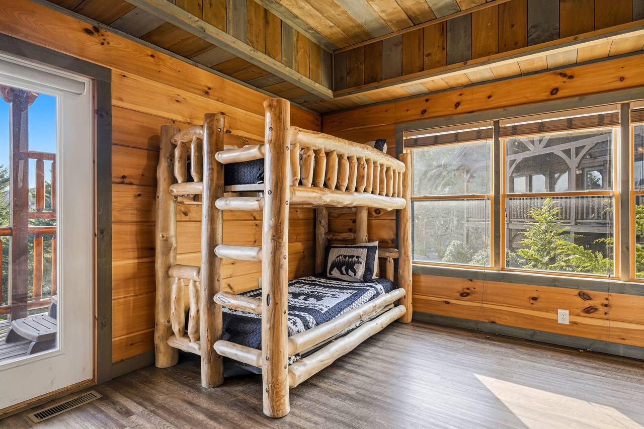 Lower level game area with twin-over-twin bunk beds Lower level game area with twin-over-twin bunk beds