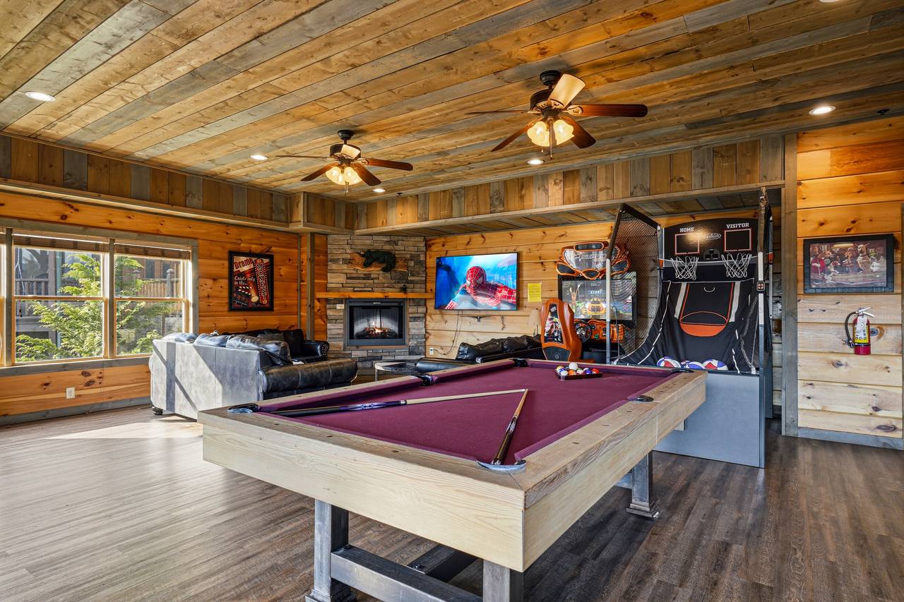 Game room with pool table & arcade fun Game room with pool table & arcade fun