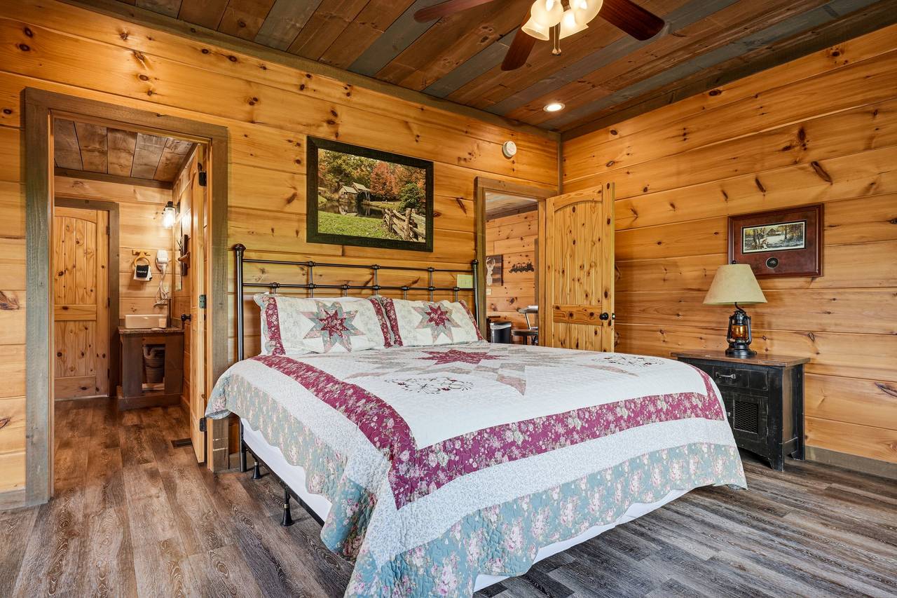 Entry King Suite: Deck Access, Fireplace, TV, & Mountain Views Entry King Suite: Deck Access, Fireplace, TV, & Mountain Views