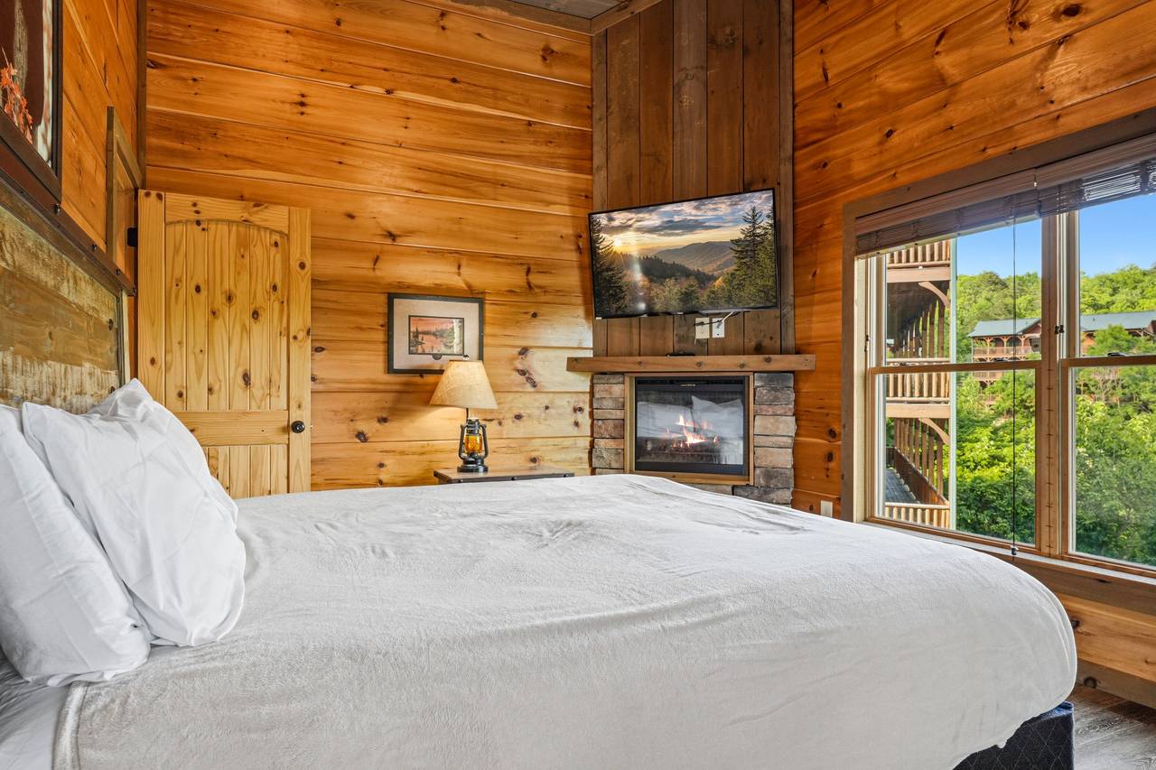 King with Ensuite Full Bath, Fireplace, TV, & Deck Access King with Ensuite Full Bath, Fireplace, TV, & Deck Access