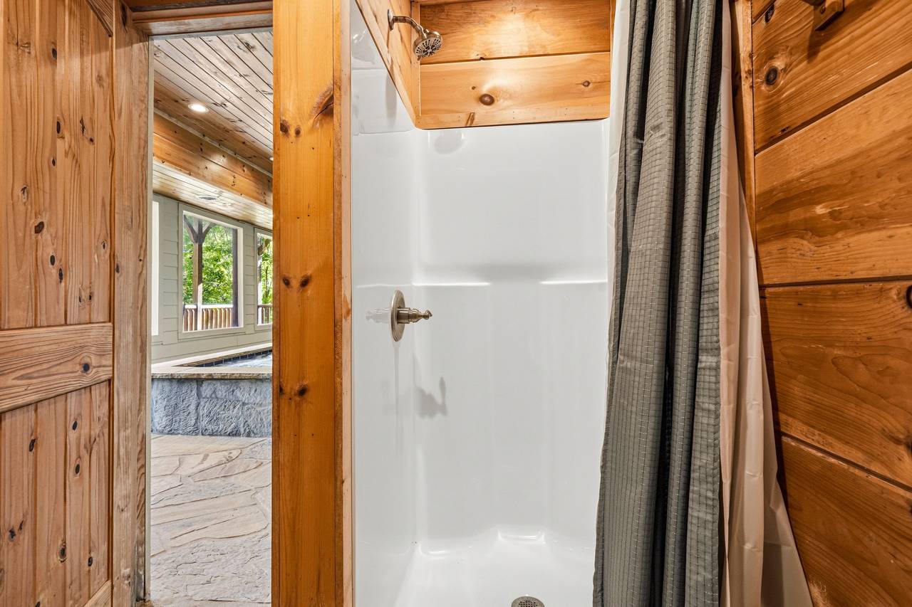 Full Bathroom by the Pool for Easy Access with Shower Full Bathroom by the Pool for Easy Access with Shower