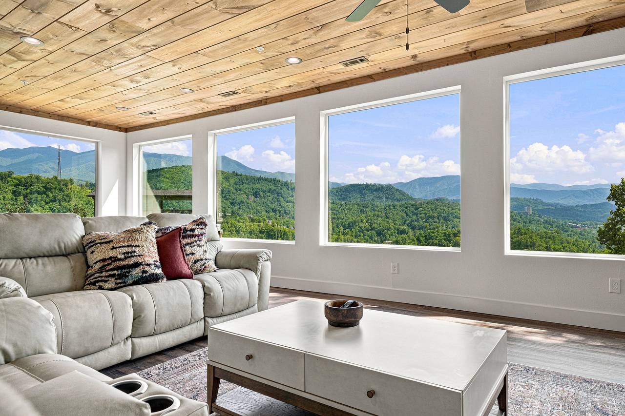 Cozy living room with fireplace, Smart TV & mountain views Cozy living room with fireplace, Smart TV & mountain views