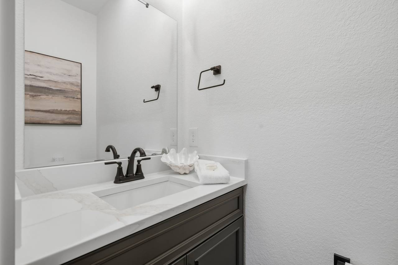 Half bath off the living room Half bath off the living room