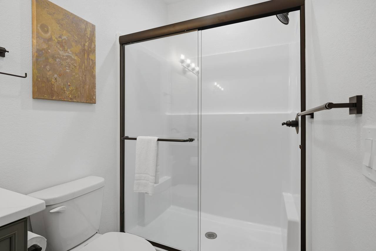 Entry King ensuite bathroom with spacious standing shower Entry King ensuite bathroom with spacious standing shower