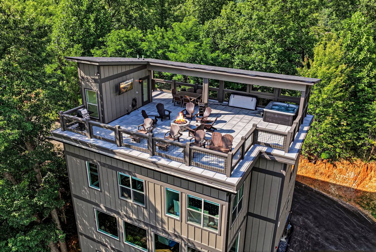 Private rooftop oasis with hot tub, fire pit & seating Private rooftop oasis with hot tub, fire pit & seating