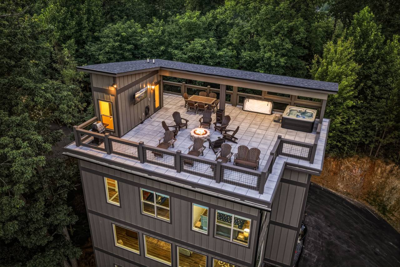 Private rooftop oasis with hot tub, fire pit & seating Private rooftop oasis with hot tub, fire pit & seating