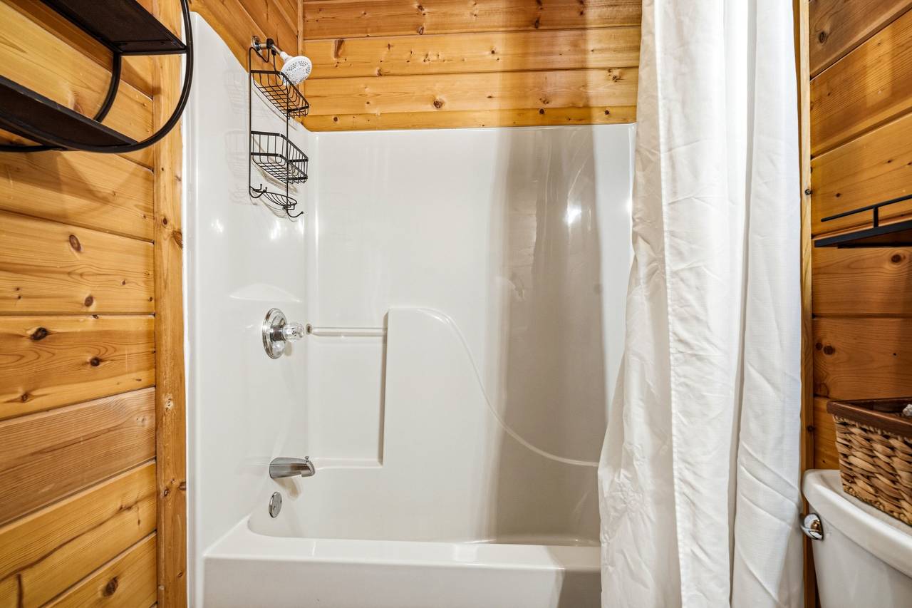 Full bathroom with tub and shower combo Full bathroom with tub and shower combo