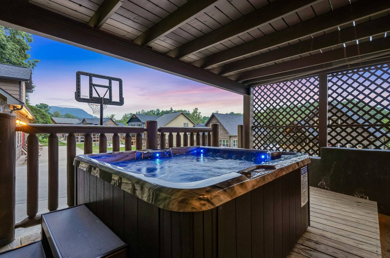 Covered hot tub with relaxing mountain views Covered hot tub with relaxing mountain views