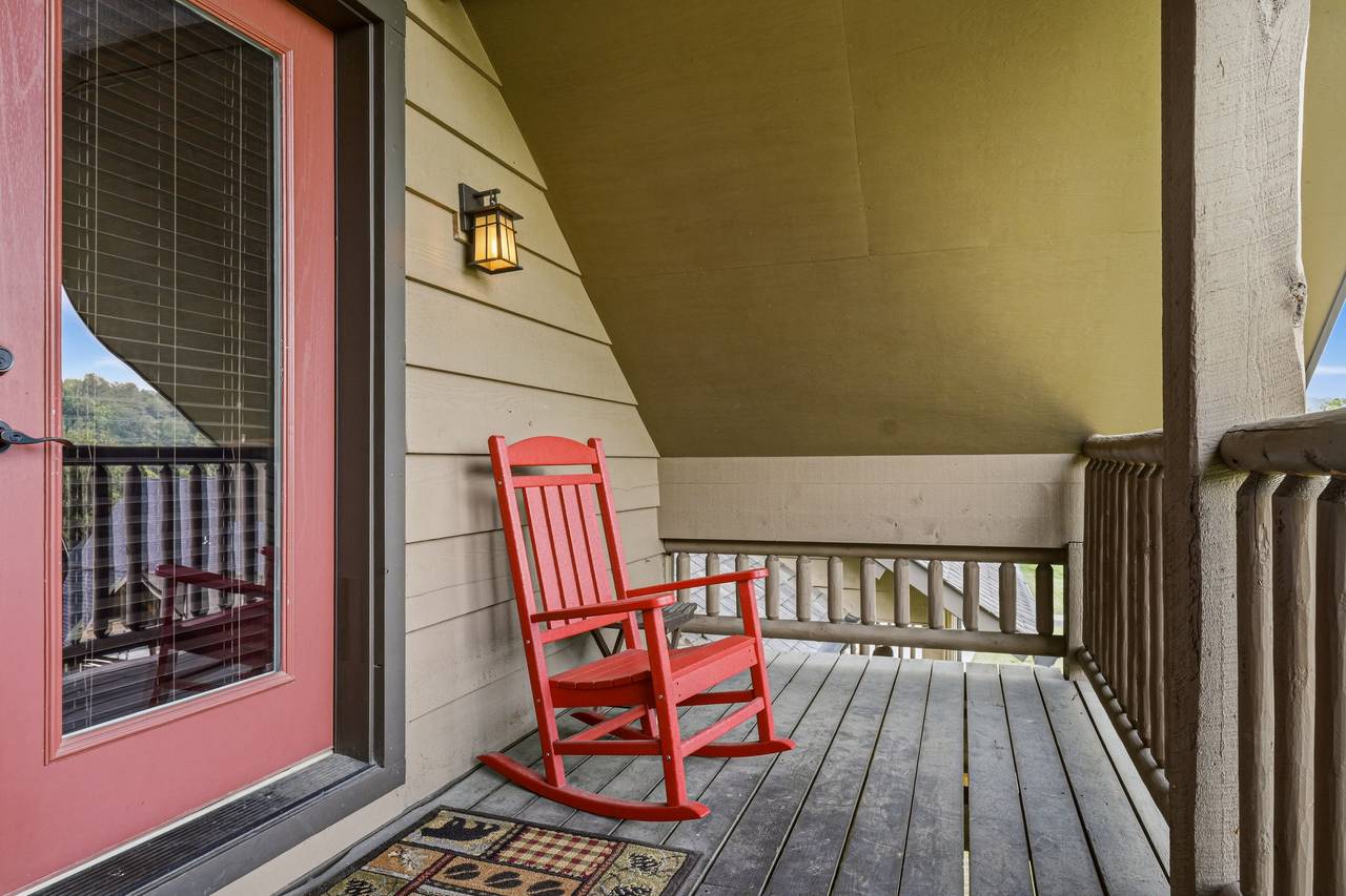 Private covered balcony with rocking chairs Private covered balcony with rocking chairs