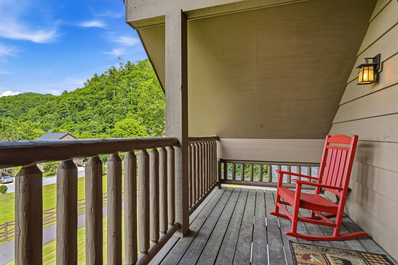 Private covered balcony with rocking chairs Private covered balcony with rocking chairs