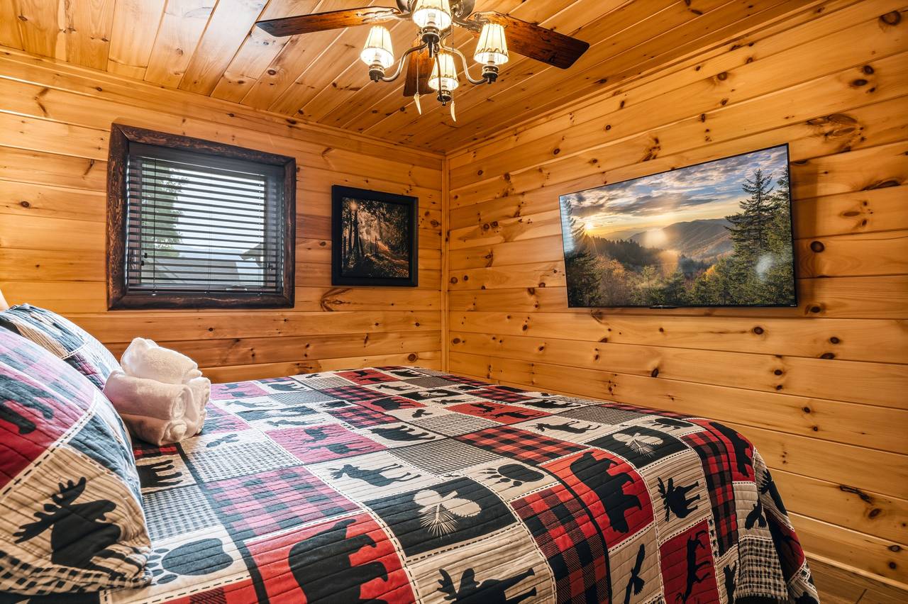 Comfortable king bedroom with flat-screen TV Comfortable king bedroom with flat-screen TV