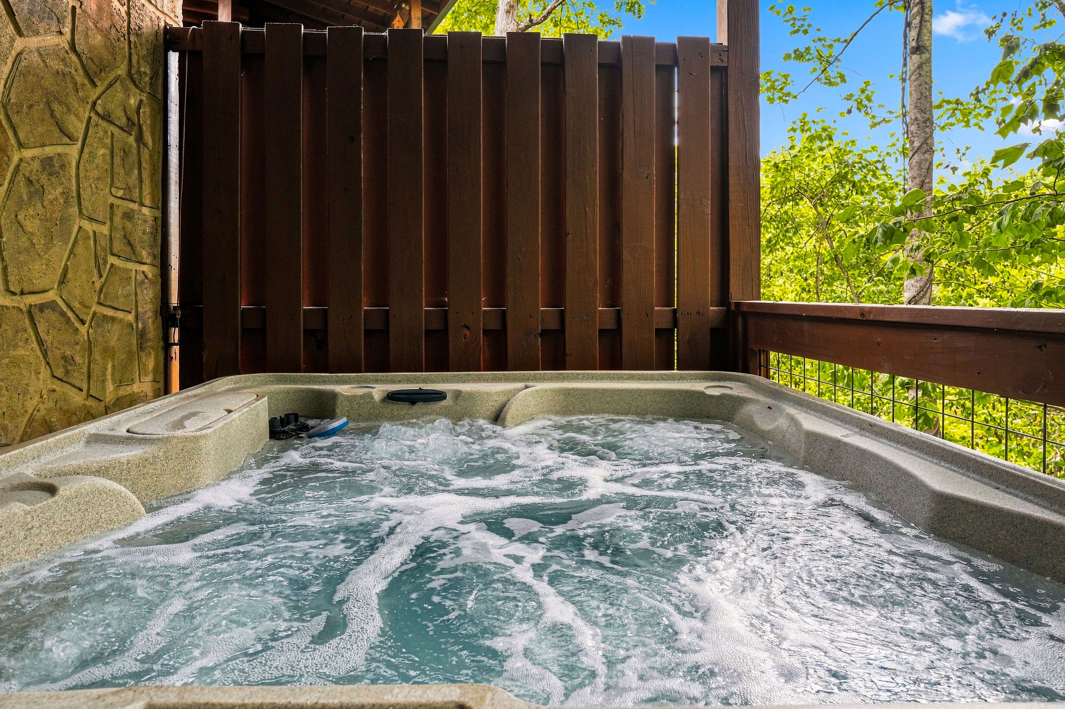 Private hot tub on the lower covered deck