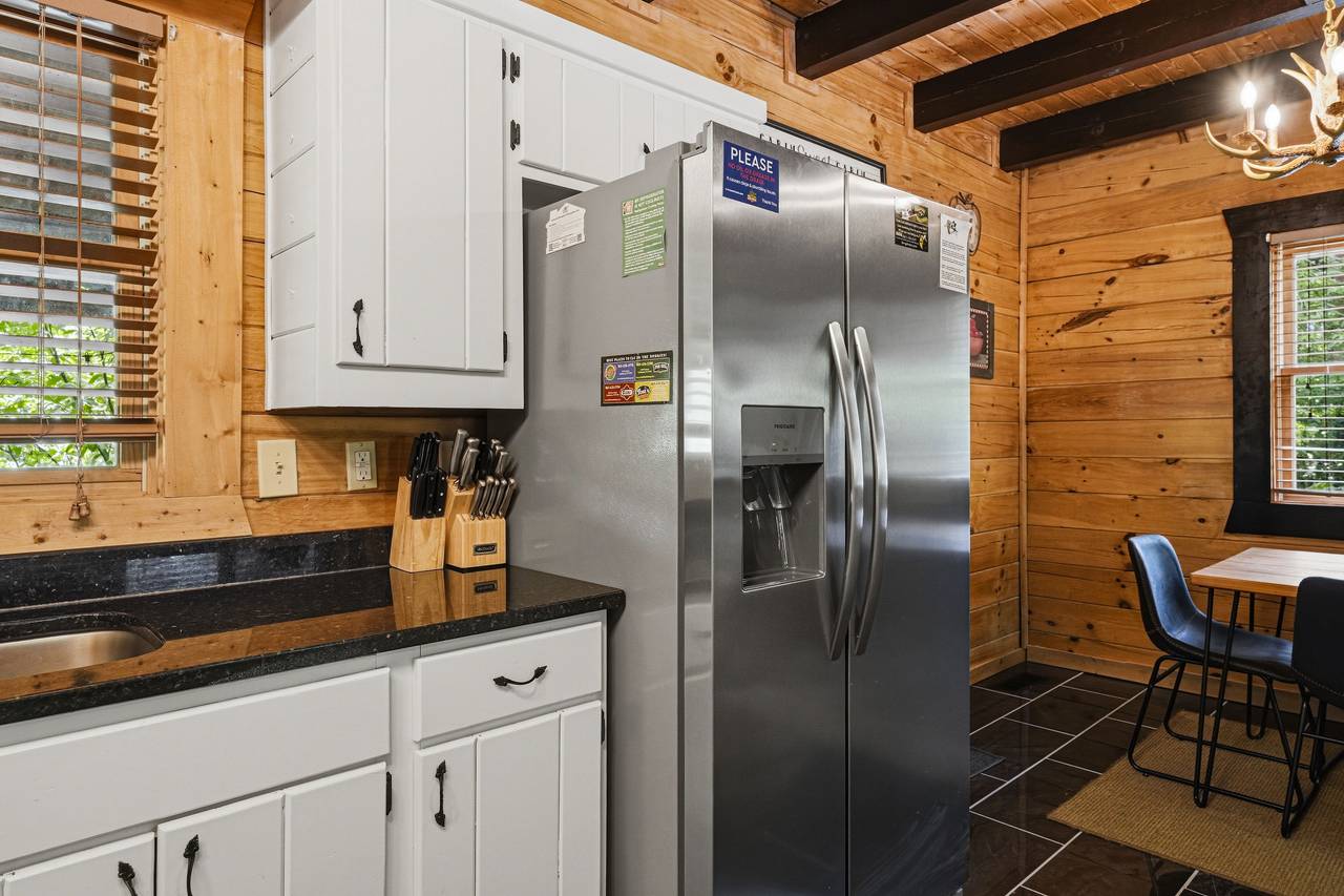 Open kitchen with granite counters and stainless appliances Open kitchen with granite counters and stainless appliances