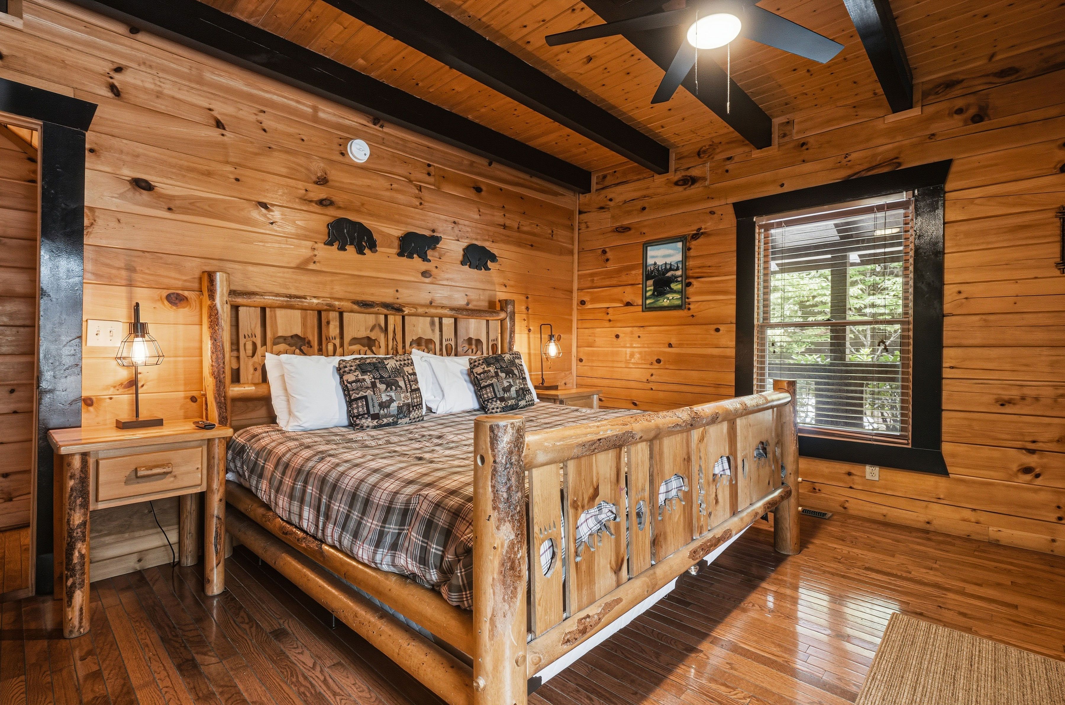 Entry-level king bedroom with TV and private ensuite bath