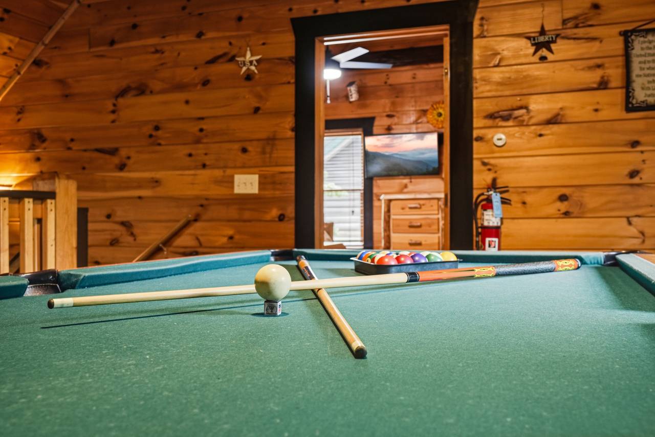 Challenge the family to a game of pool Challenge the family to a game of pool