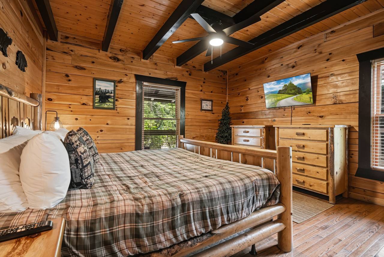 Entry-level king bedroom with TV and private ensuite bath Entry-level king bedroom with TV and private ensuite bath