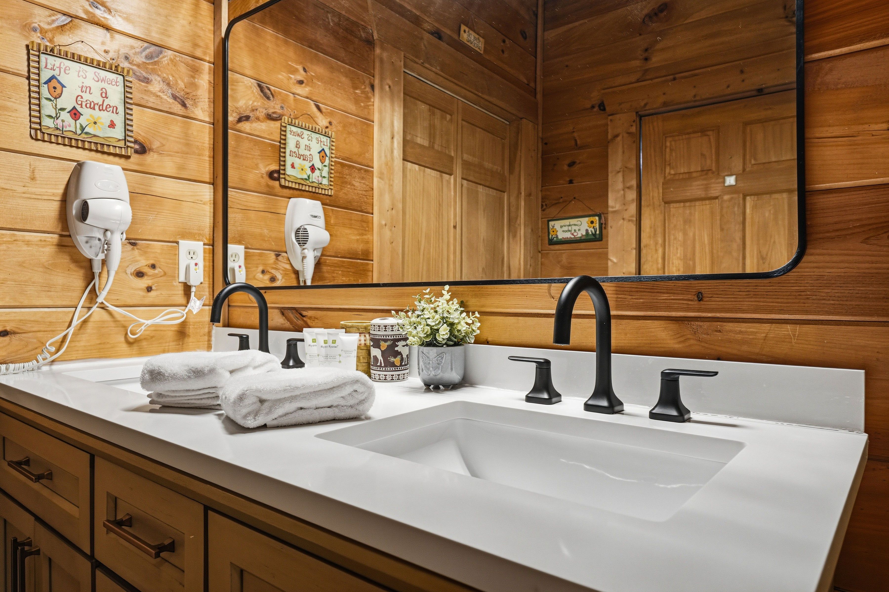 Upper-level ensuite bath with walk-in shower