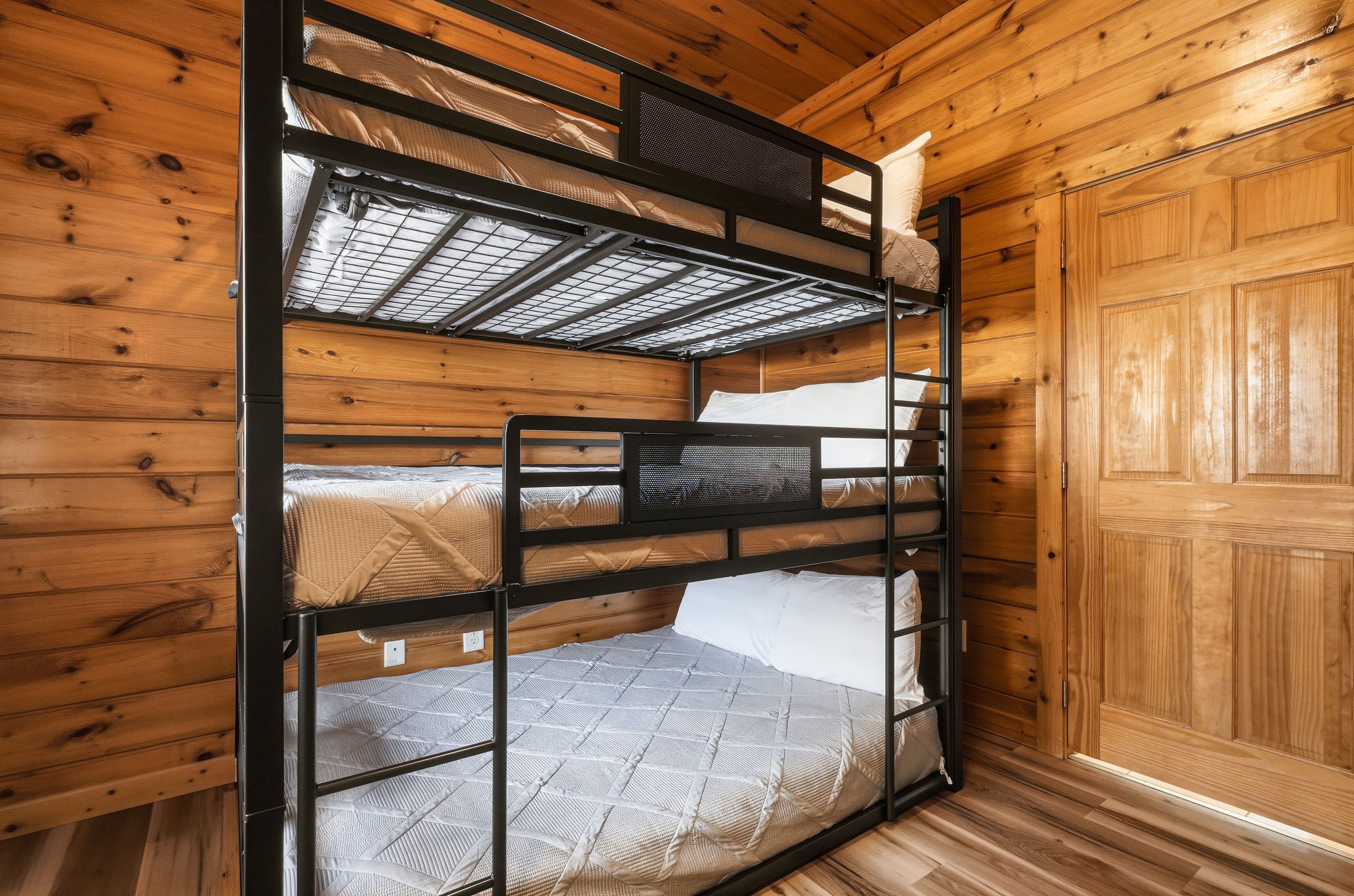 Lower-level triple full bunk bedroom