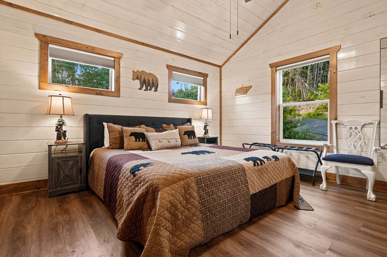 <span class="name">Upper-level bedroom with comfortable king bed</span> <span class="name">Upper-level bedroom with comfortable king bed</span>
