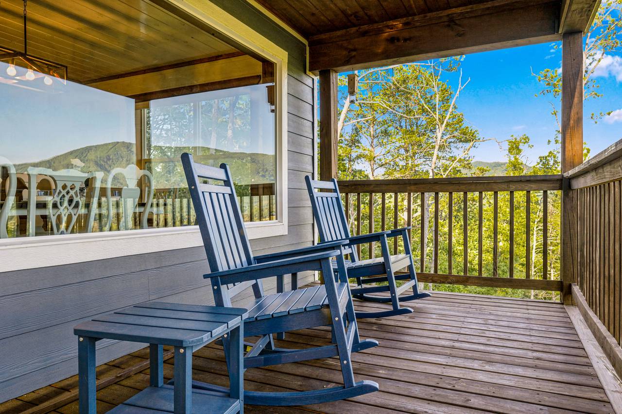 <span class="name">Peaceful deck space with classic rocking chairs</span> <span class="name">Peaceful deck space with classic rocking chairs</span>