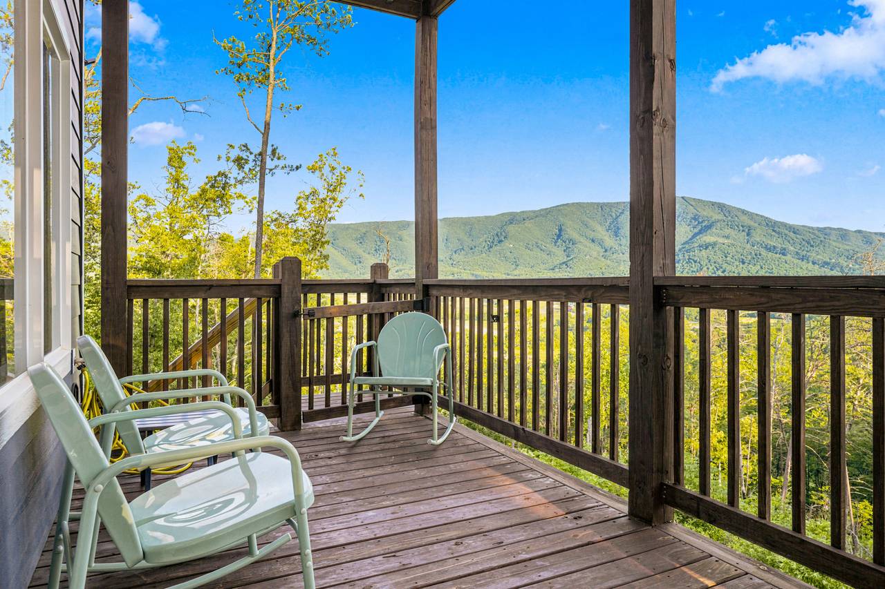 <span class="name">Rocking chairs on the deck with peaceful mountain air</span> <span class="name">Rocking chairs on the deck with peaceful mountain air</span>