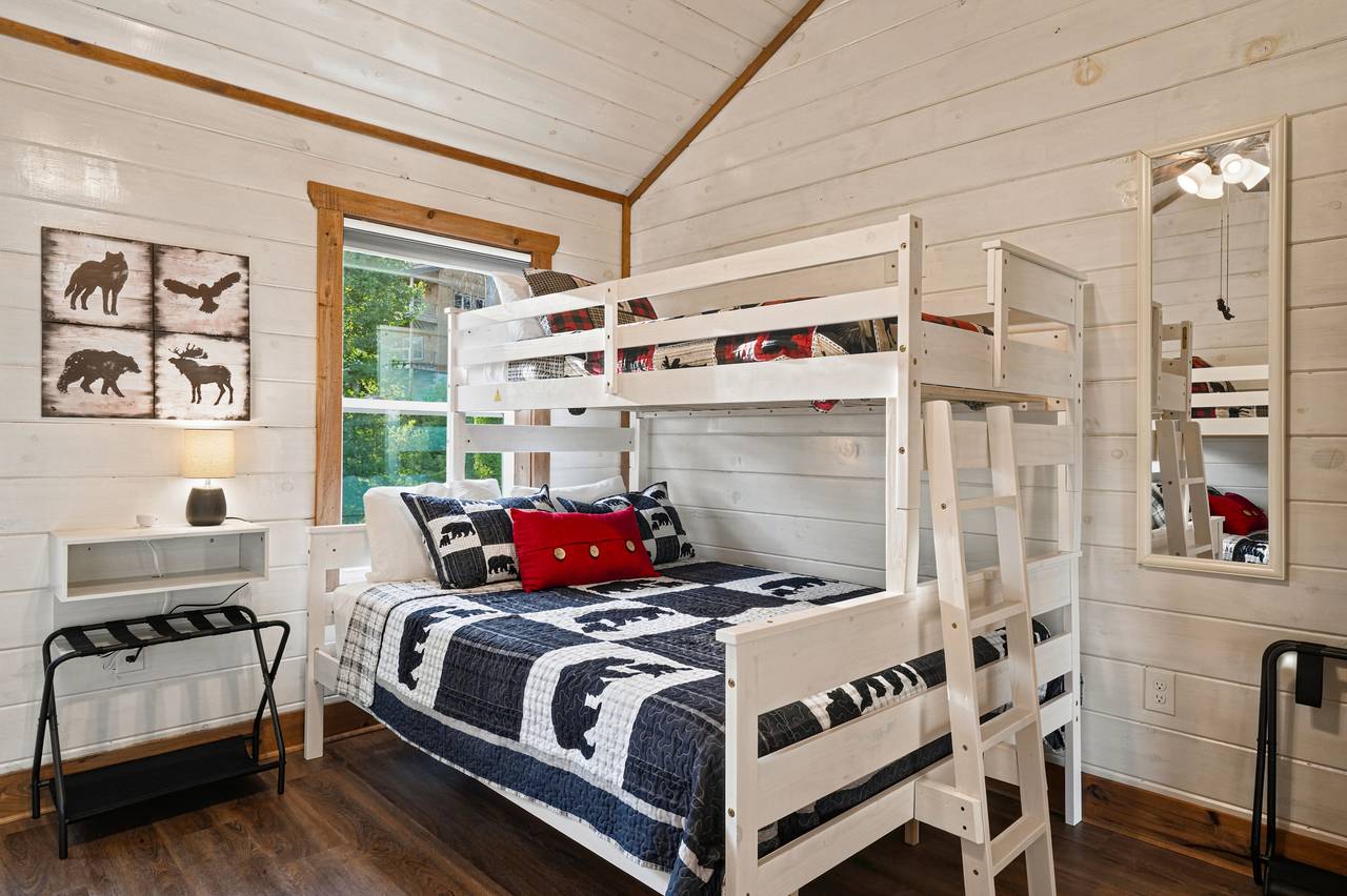 <span class="name">Upper-level bunk room with 2 twin-over-queen bunks</span> <span class="name">Upper-level bunk room with 2 twin-over-queen bunks</span>