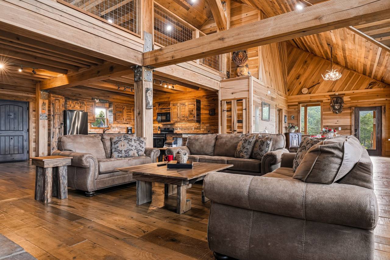 <span class="name">Spacious living room with plush seating & Smart TV</span> <span class="name">Spacious living room with plush seating & Smart TV</span>