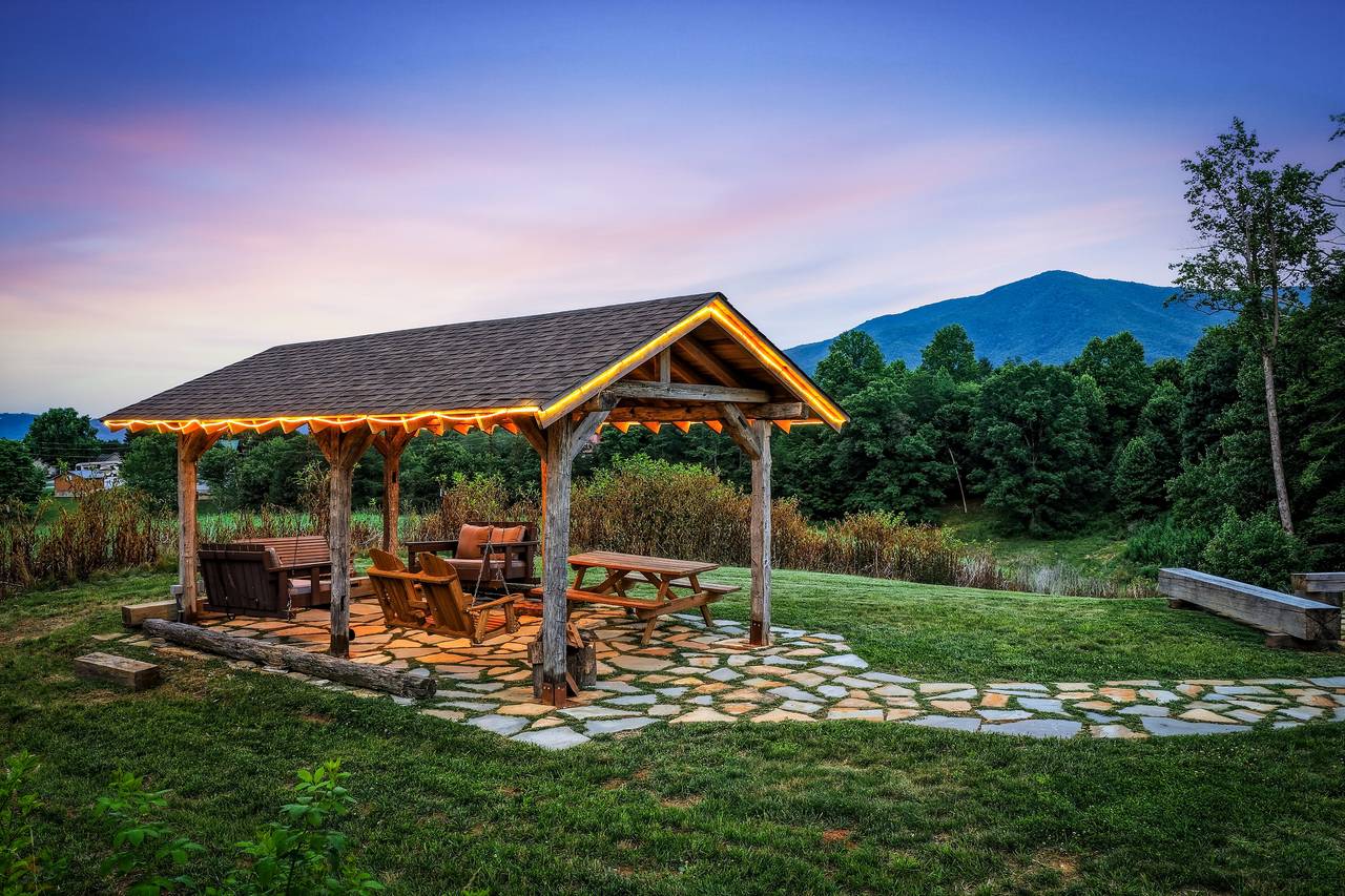 <span class="name">Pavilion with hanging bed swings & picnic seating</span> <span class="name">Pavilion with hanging bed swings & picnic seating</span>