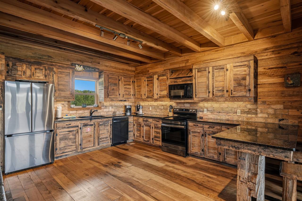 <span class="name">Kitchen with stainless steel appliances & granite counters</span> <span class="name">Kitchen with stainless steel appliances & granite counters</span>