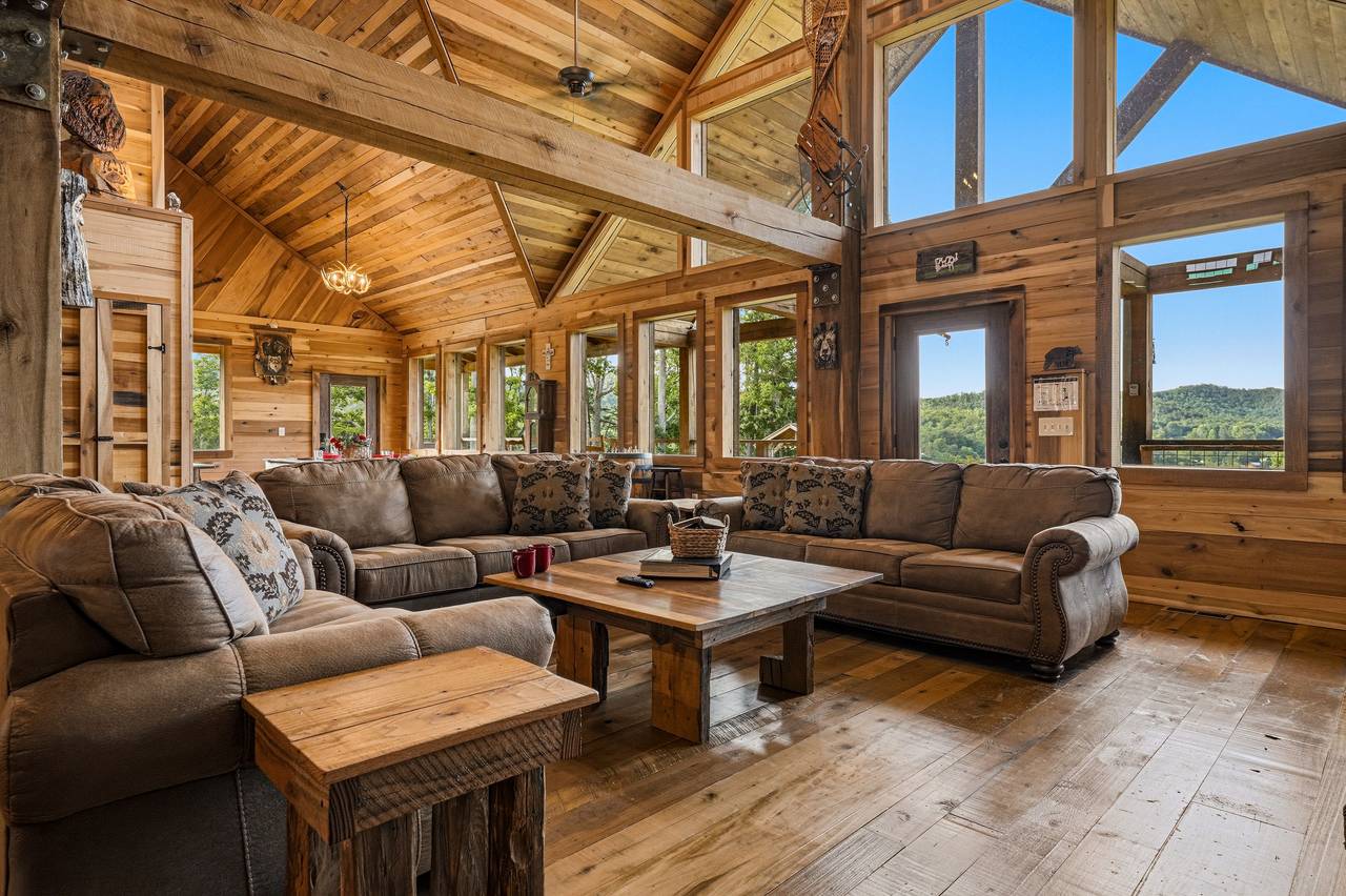 <span class="name">Spacious living room with plush seating & Smart TV</span> <span class="name">Spacious living room with plush seating & Smart TV</span>