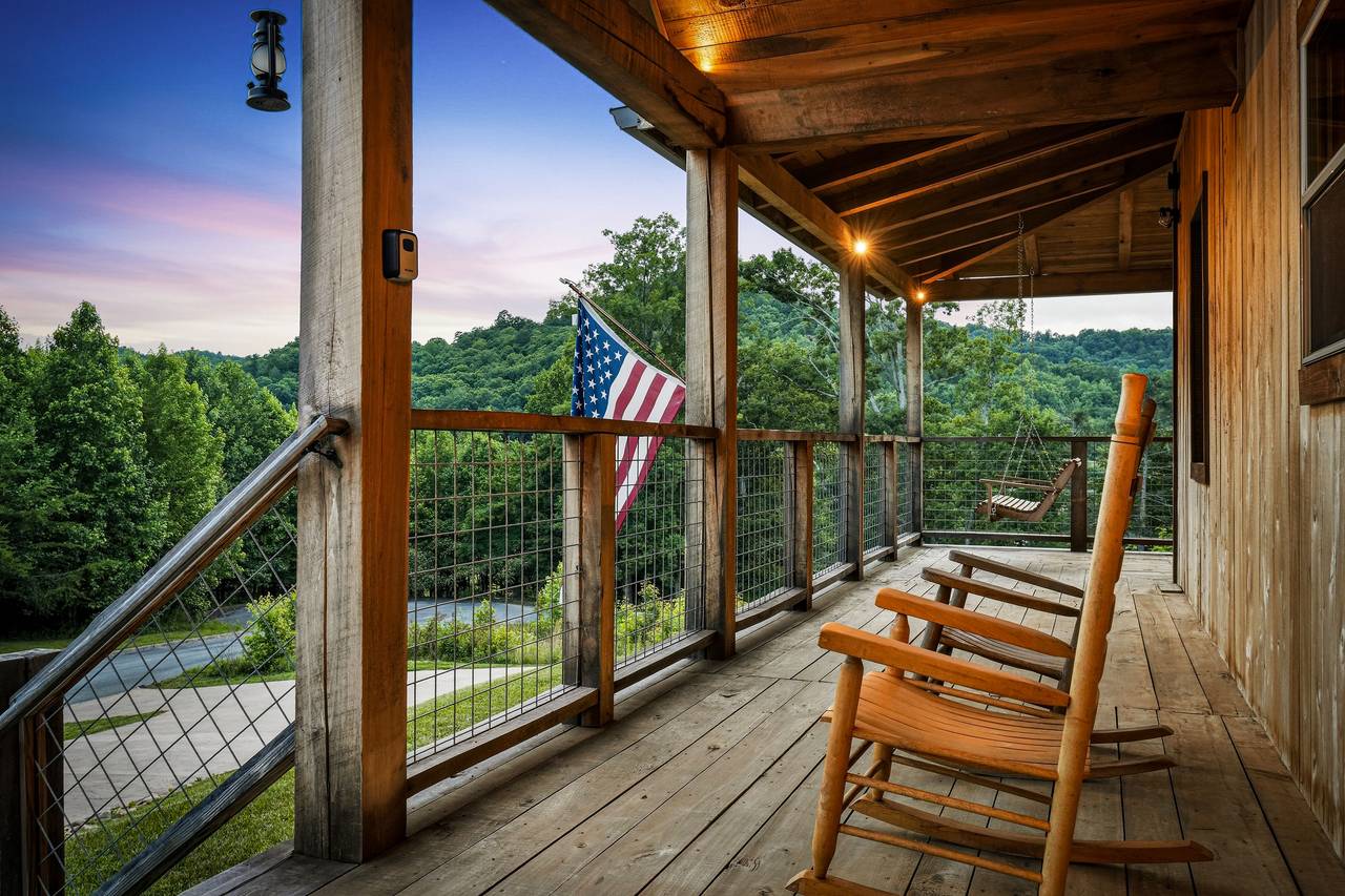 <span class="name">Wraparound porch with peaceful mountain surroundings</span> <span class="name">Wraparound porch with peaceful mountain surroundings</span>