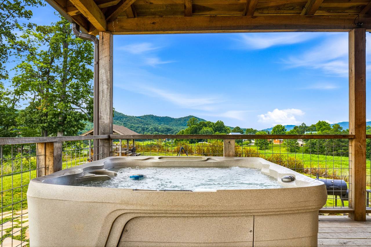 <span class="name">Private hot tub for relaxing after Smoky Mountain adventures</span> <span class="name">Private hot tub for relaxing after Smoky Mountain adventures</span>