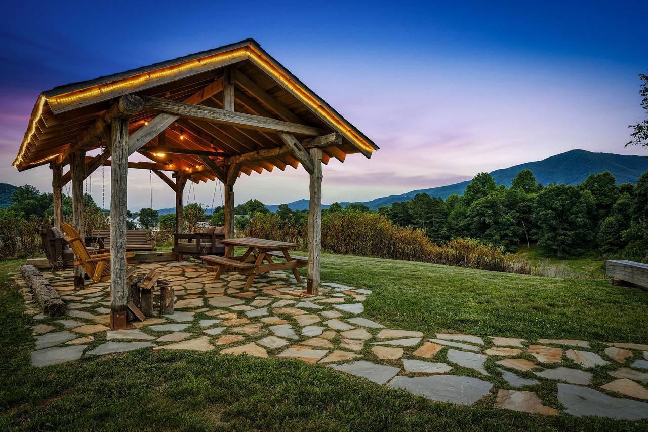 <span class="name">Pavilion with hanging bed swings & picnic seating</span> <span class="name">Pavilion with hanging bed swings & picnic seating</span>