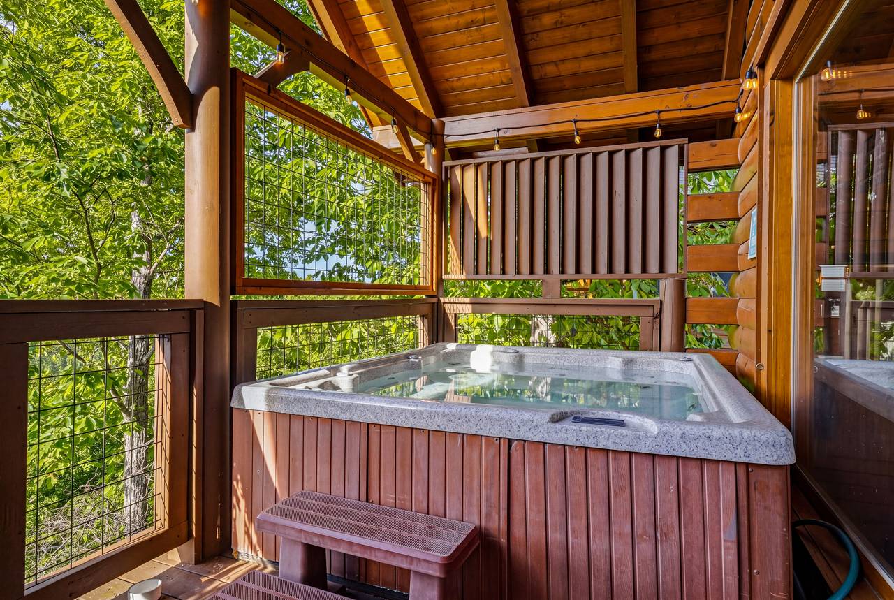 <span class="name">Six-person hot tub with peaceful mountain setting</span> <span class="name">Six-person hot tub with peaceful mountain setting</span>